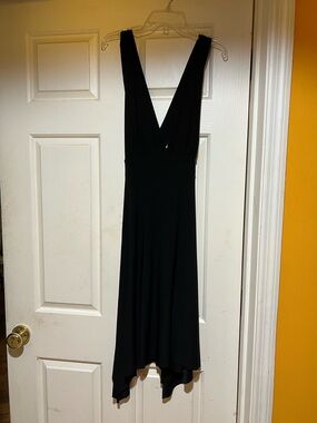 Sleeveless Black Midi Dress with Deep V-Neck